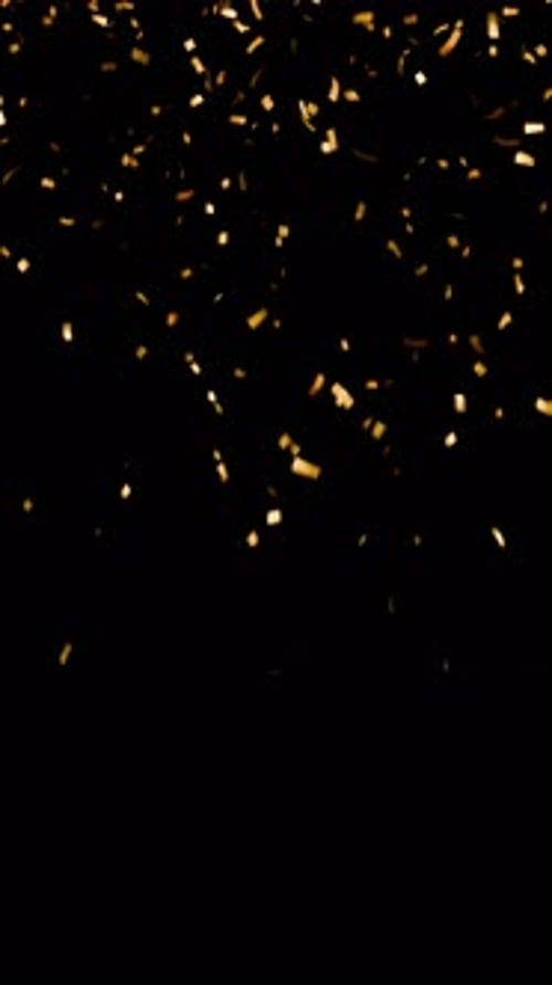 golden falling confetti on black background. decorative celebration confetti for party celebrations