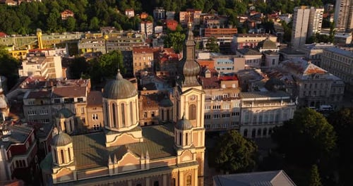 Cathedral of the Nativity of the Theotokos With Domes And Clock Tower In Evening Light. Sarajevo,