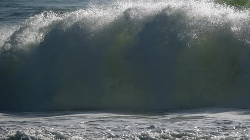 Huge Rolling Waves On Rough Shoreline During Stormy Day. Close Up Shot, Slow Motion