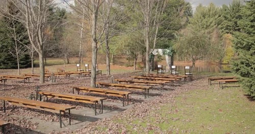 Beautiful outdoor wedding ceremony venue during the fall season at Bean Town Ranch in Ottawa.