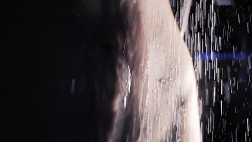 Water Cascading Over Torso in Shower Close Up