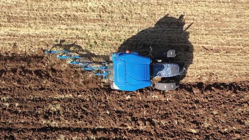 Aerial View Of Tractor Working In Farmland 3