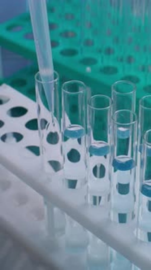 Adding a Blue Drop to a Test Tube