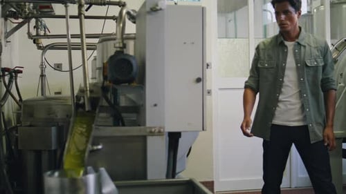 Focused Guy Pushing Buttons at Press Indoors Close Up