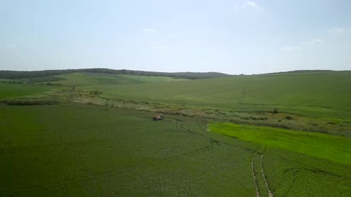 Spray Fertilize On Field With Chemicals In Agriculture Field