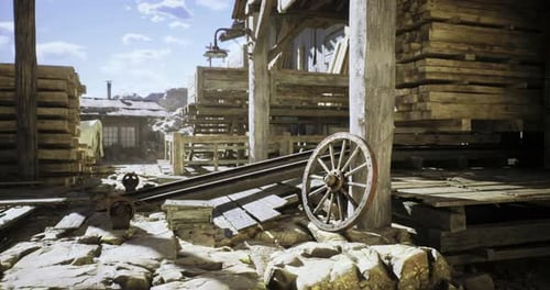 Old Western Town with Lumber Stacks and Wagon Wheel