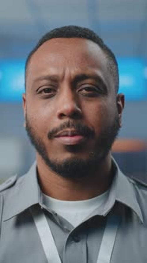 Airport Security Checkpoint Portrait of Security Officer in Uniform Looking at Camera