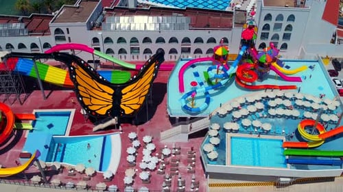Aerial shot of aquapark with drone. Aerial view of water slides.colorful.