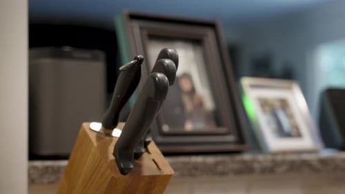A kitchen Knife Block with one Knife missing.