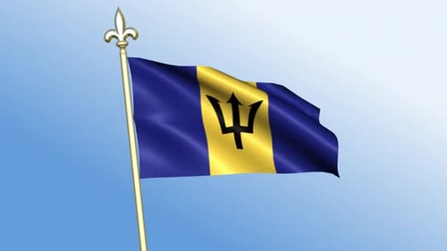 Barbados Flag Waving on Golden Pole Against Blue Sky