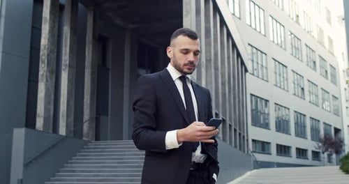 Attractive Young Male Office Worker in a Formal Clothes Making an Appointment Hardworking Caucasian