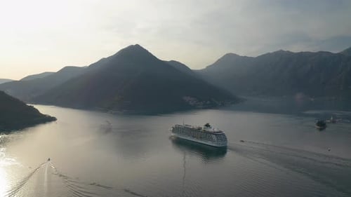 Large cruise ship passing through the picturesque bay of Kotor in Montenegro