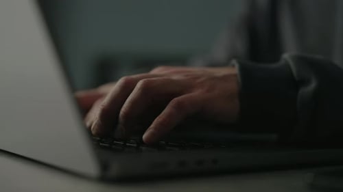 Closeup Hands of Unrecognizable Programmer Male Typing on Laptop Keyboard Immersed in Software