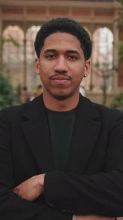 Confident Young Adult Poses in Urban Setting