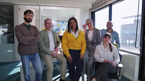 Startup Business Team Posing Together in Modern Office Collaboration and Success