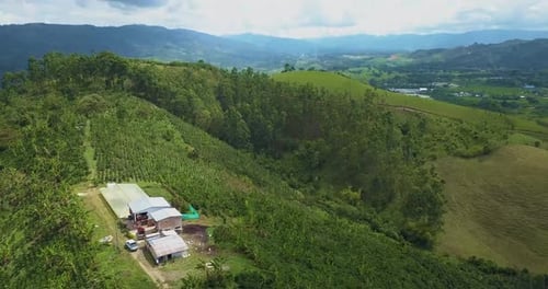 Aerial shot of farmers living on lush mountainside, Huila, Colombia