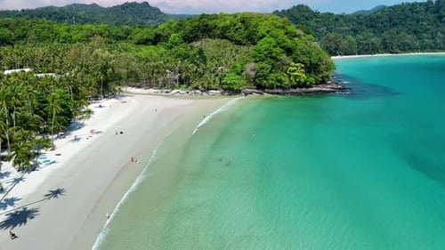 Discover the Serenity of Koh Kood Island with Crystal Clear Waters and Lush Greenery