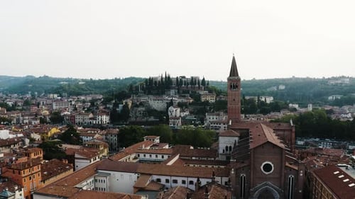 Aerial view pushing towards the Arno River in Verona, Italy.