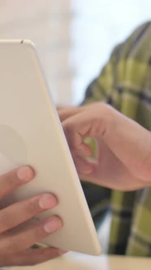 Close Up of African Man Using Tablet, Vertical Video