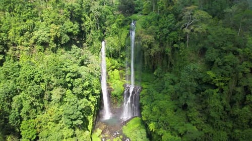 Popular tourist waterfall Sekumpul in the island of Bali, aerial view of a popular tourist spot in I