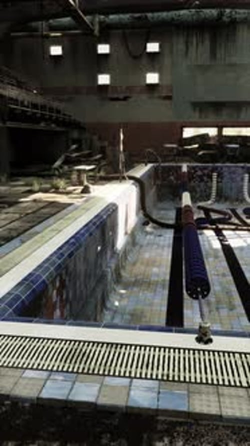 Desolate Empty Swimming Pool in Abandoned Building