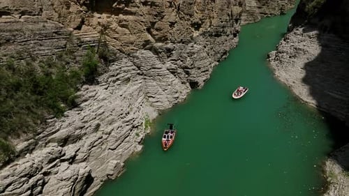 Summer Journey Through the Canyon Guided By the Flowing River and Surrounded By Mountains Aboard a