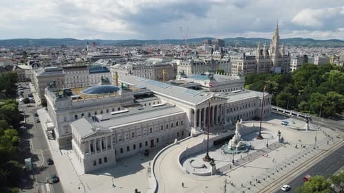Drone establishing orbit of the Austrian Parliament in Vienna with surrounding landmarks
