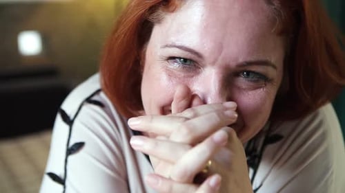 Redhead Woman Laughing Indoors Close Up