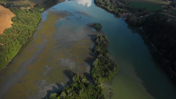 Aerial footage of beautiful sunrise over the Tiber river, north of Rome ...