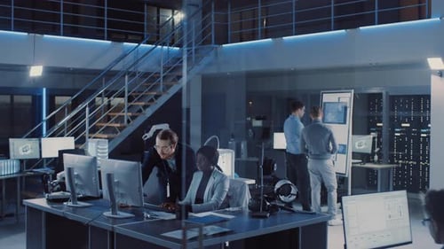 Team Working on Computers in Modern Office