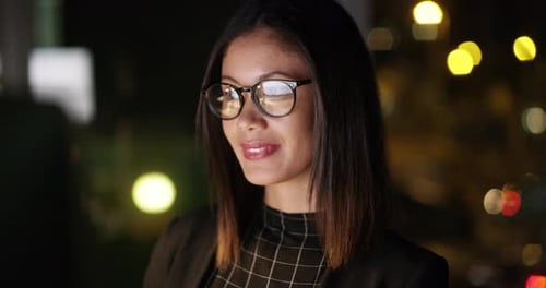 Business woman, computer and glasses at night while working in office
