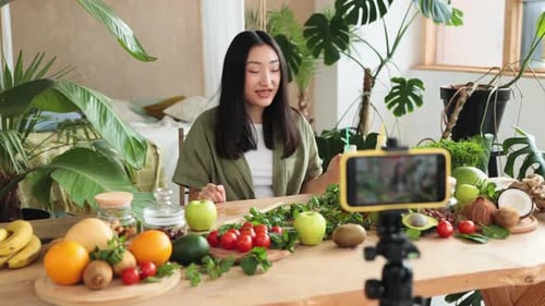 Woman Recording Video About Healthy Food and Nutrition