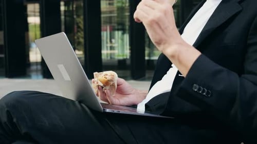 Busy Office Man Guy Eating a Hot Dog Instead of a Proper Lunch and Working Take Away Food Delivery