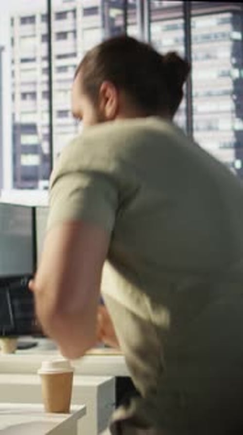 Vertical Video System Administrator Checking Machine Learning Results on Tablet