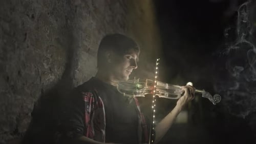 Violinist Plays Illuminated Electric Violin at Night