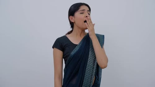 Woman Gesturing and Speaking Indoors