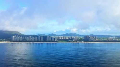Aerial Top view of a transparent blue sea with beautiful waves at sunny day in summer. air of ocean