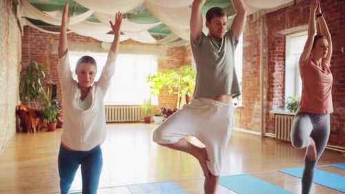 Group of people in a yoga class