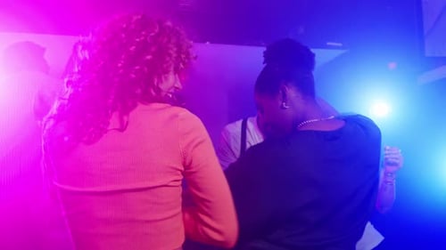 Friends Enjoying a Night Out Dancing