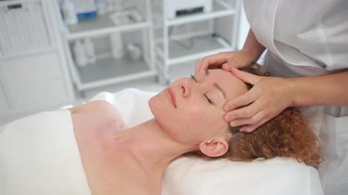 Face Massage for Woman in Cosmetology Clinic
