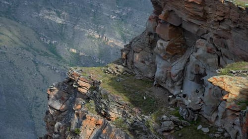 Cliff Edge Scenery Crag Overlooking Rugged Landscape Jagged Cliff With Boulders And Grass Creative