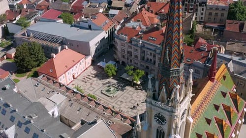 Beautiful church spire in central Novi Sad, aerial view of Serbian city