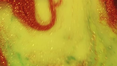 Glittering Bronze and Green Liquid Flowing Abstractly