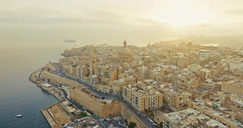 Stunning Aerial View of Valletta Malta at Sunset Featuring the Cityscape