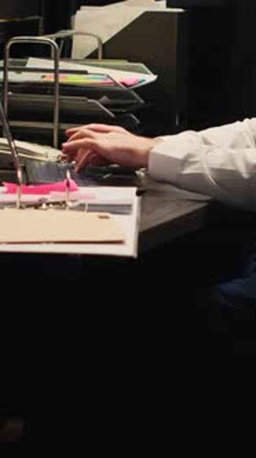 Adult Typing at Computer in Office Setting