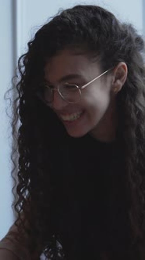 Moroccan Woman In Front Of Laptop Having Online Meeting Thru Video Call At Cafe Restaurant Medium