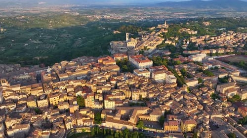 Establishing Aerial View of Perugia City Skyline at Sunset Golden Hour Italy