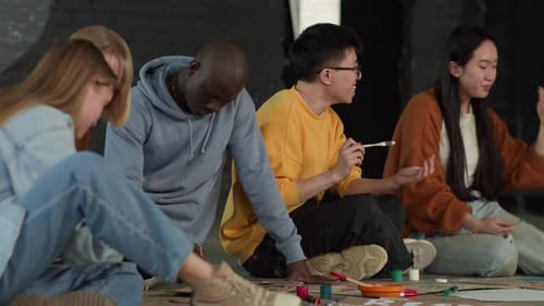 A Group of Young People Draw Posters and Protest Against Environmental Pollution