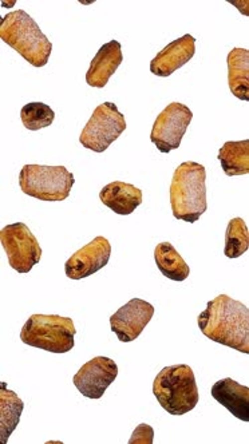 Seamless Loop of Falling Pain au Chocolat Pastries