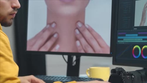 Freelance Videographer Colorist Editing Footage Using Professional Software Monitor and Montage